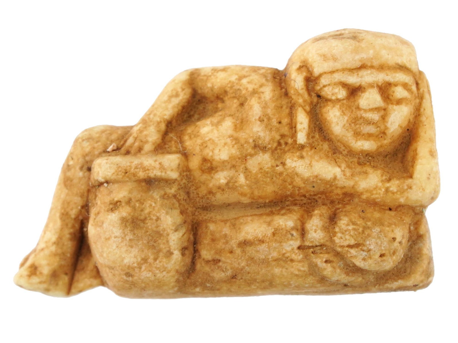 ANCIENT EGYPT CARVED EROTIC AMULET 100 TO 30 BC: An Ancient Egyptian erotic amulet hand carved of bone, Ptolemaic period, 100 to 30 B.C. The amulet represents a male figure lying on his erect phallus. Pierced for suspension. Ancient Egypt Amulets, A