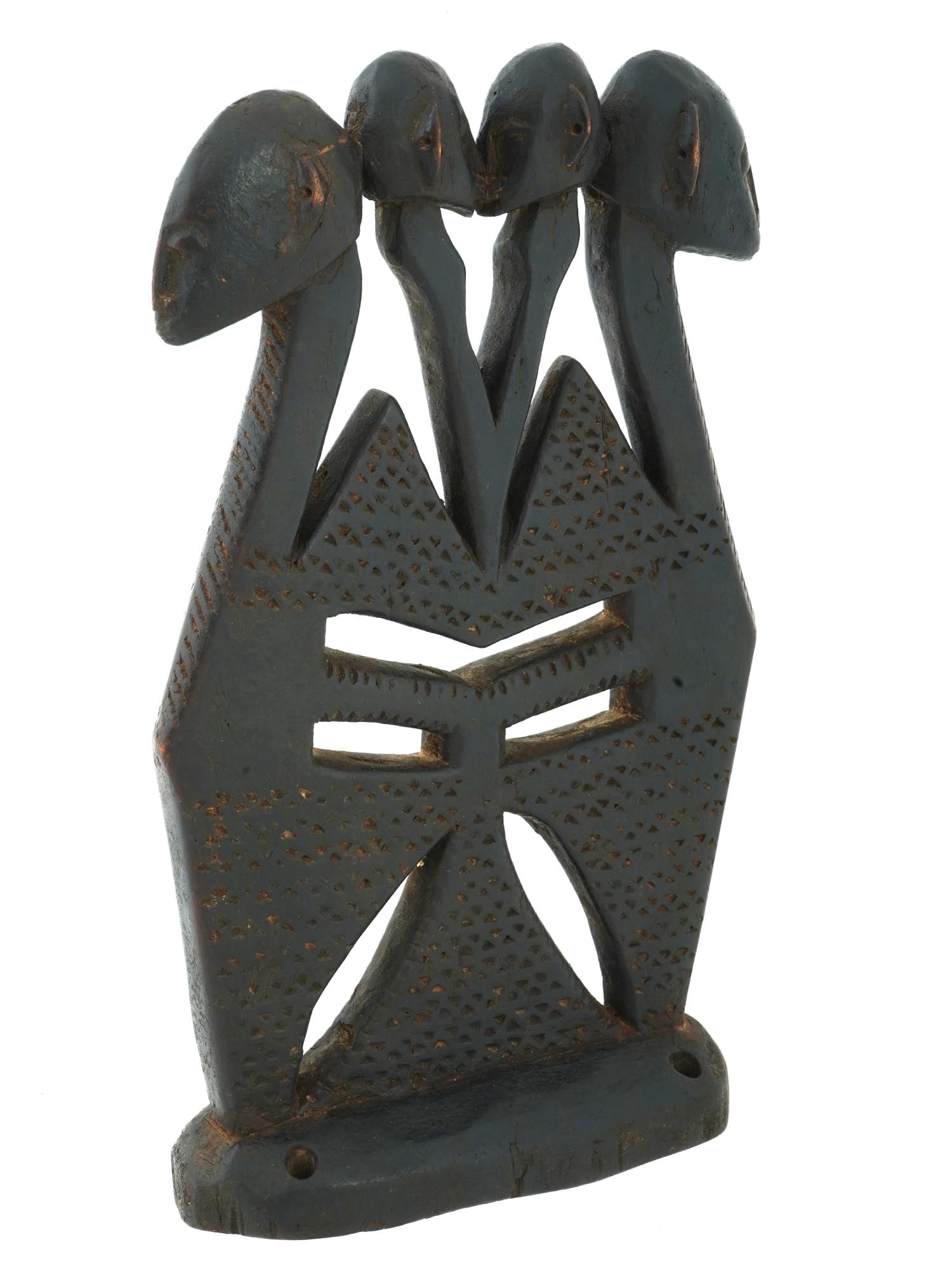 WEST AFRICAN MALI SHIWARA BAMBARA CARVED FIGURINE: A West African hand carved wooden figurine from Mali, art of the Bambara people. The piece is a Chiwara or Shiwara. The figure represents a symmetrical design of four human heads. The central figurine