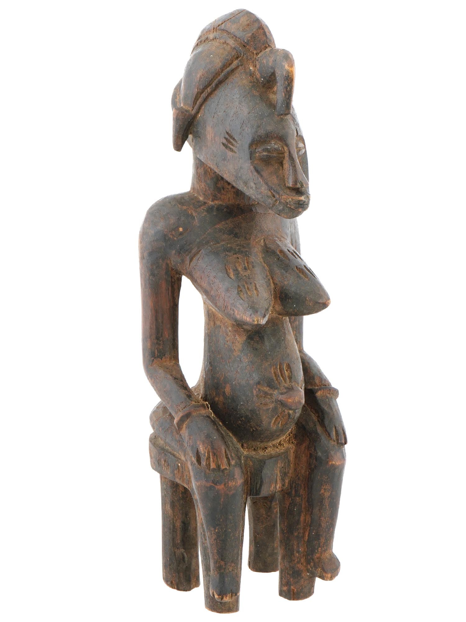 WEST AFRICAN SENEFU PEOPLE FUNERAL RITUAL FIGURE: A traditional African Senefu people funeral ritual figure from Ivory Coast. Crafted from wood with meticulous attention to detail, features a hand carved female figure sitting on a chair with a decora