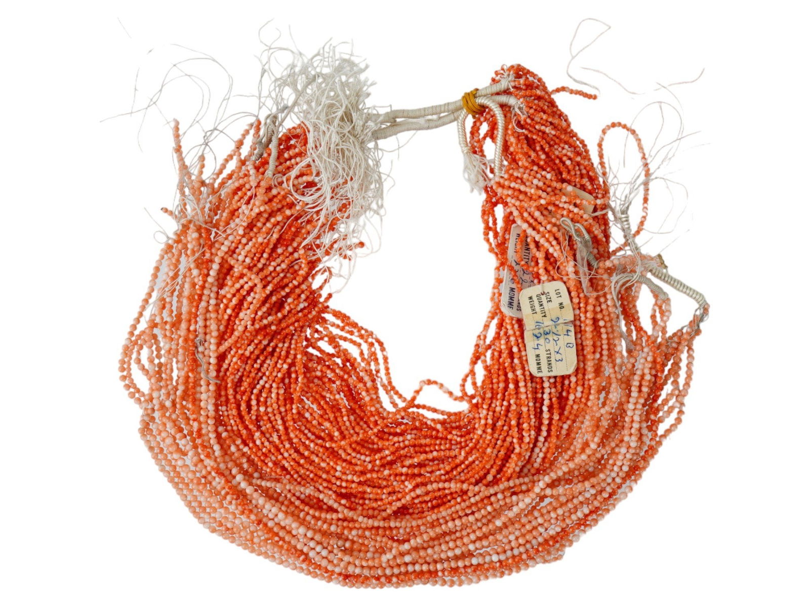 LOT OF BEADED DESIGN GENUINE ORANGE CORAL THREADS: A lot of threads necklaces made of genuine white and orange Coral stones. The necklaces are made in a beaded design. The beads are round shaped. Inscribed with paper labels. Vintage Statement Jewelry