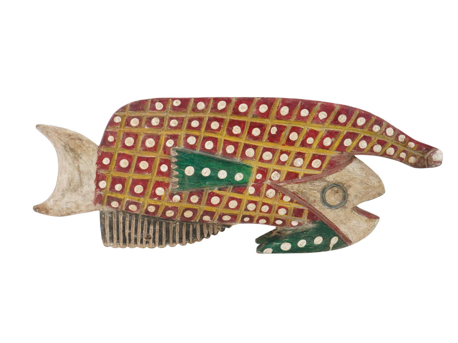 WEST AFRICAN NIGERIAN IJOH CARVED WOOD FISH MASK: A West African Nigerian Ijoh painted and crafted wooden mask. The mask is made in a fish design, decorated with carved geometrical ornaments, and covered with green, yellow, and red pigments. Only a s