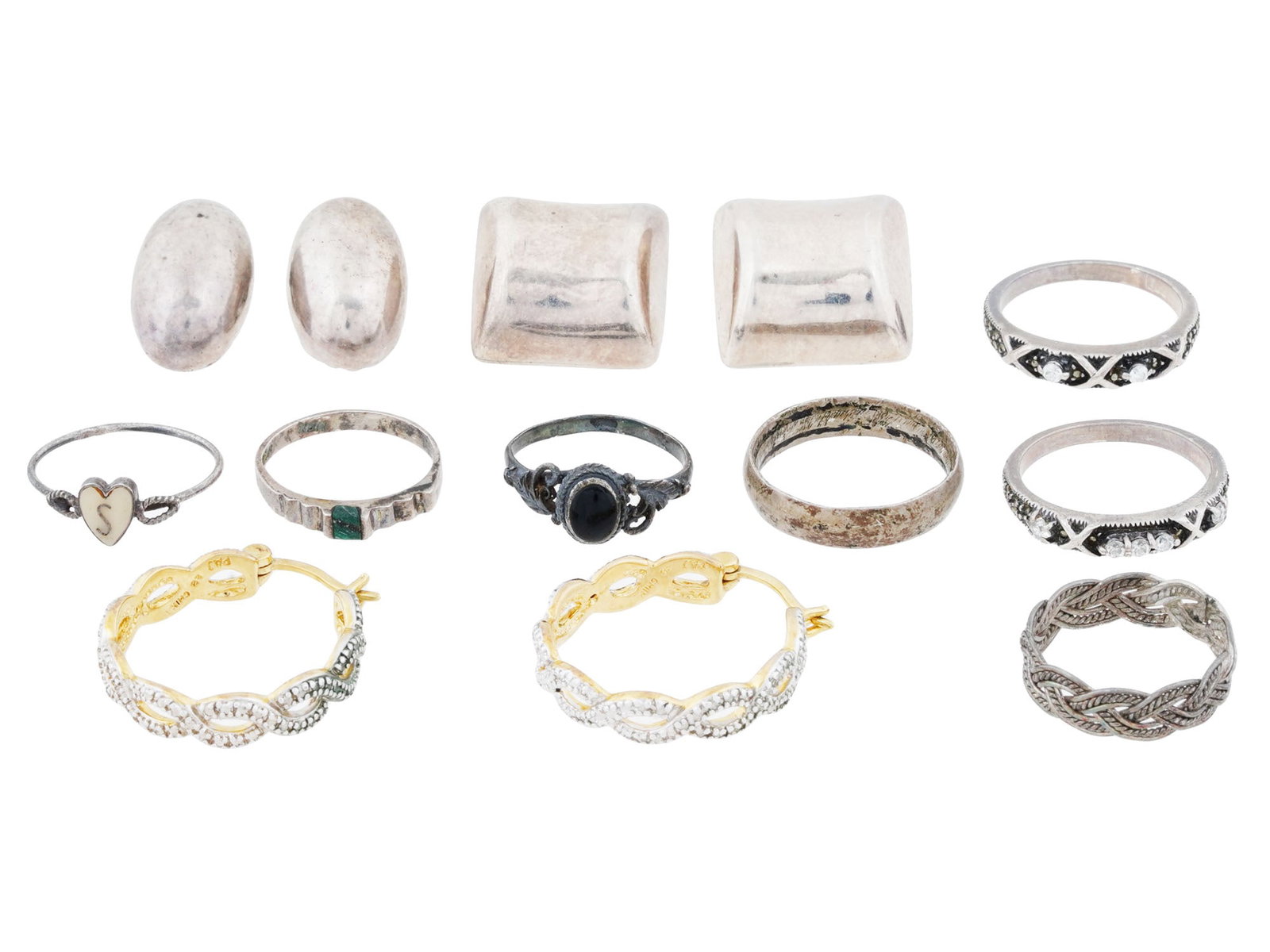 COLLECTION OF STERLING SILVER RINGS AND EARRINGS: A collection of sterling silver rings and earrings, each featuring various designs. Pieces are hallmarked and bear additional markings. Total weight 37.5 g. Vintage Jewelry for Women and Gemstones for