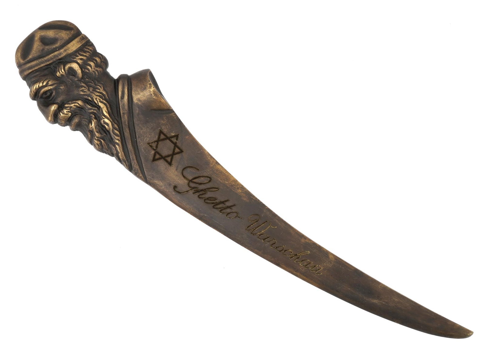 WWII MODEL HOLOCAUST WARSAW GHETTO PAPER KNIFE: A World War II type cast brass paper knife or letter opener. The figurative handle represents a profile of a Jewish man. The blade is engraved with a Magen David and inscription Ghetto Warschau. The W
