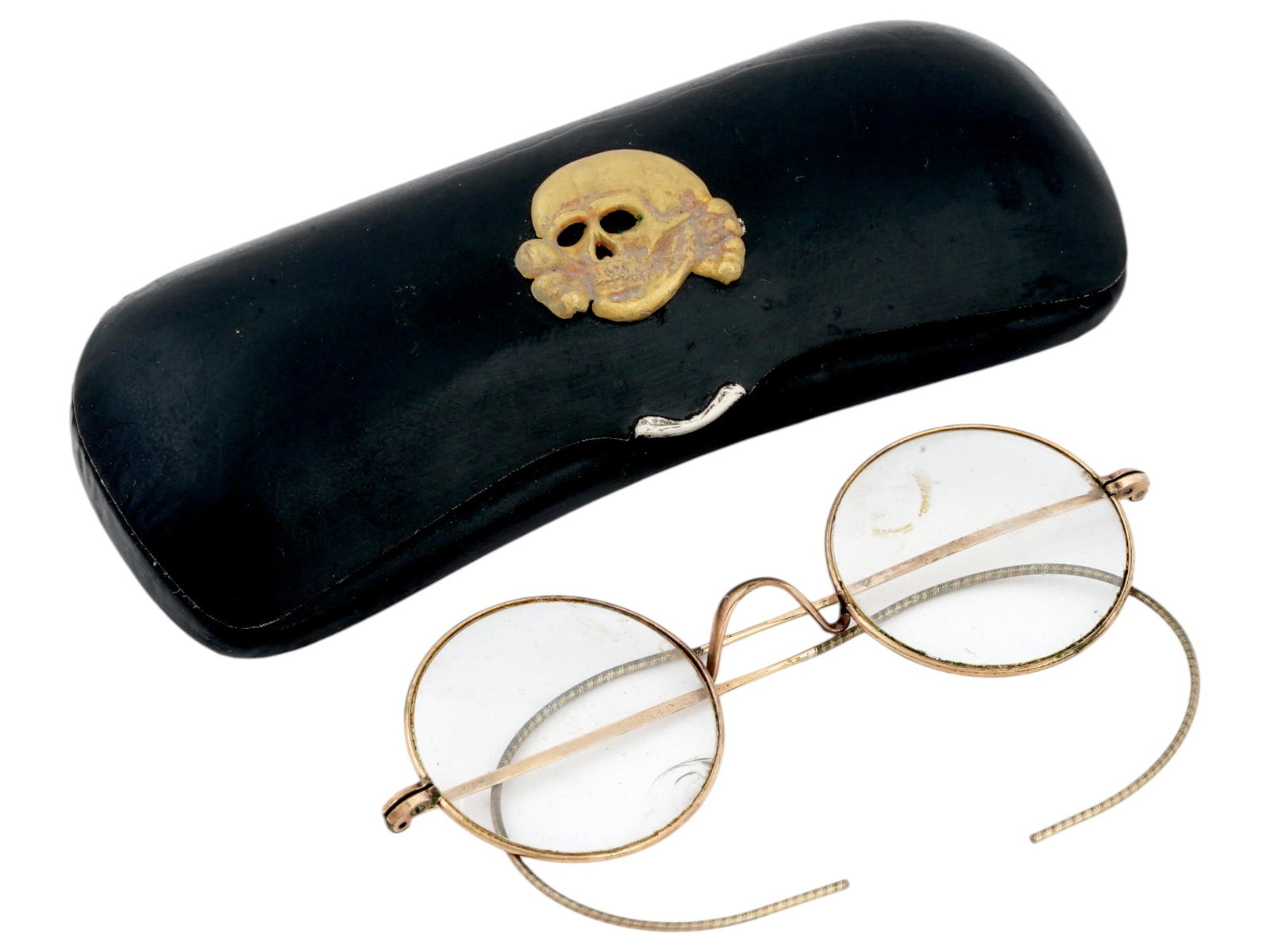 WWII NAZI GERMAN WAFFEN SS GLASSES CASE WITH GLASSES: A WWII Nazi German Waffen SS glasses case featuring the Totenkopf insignia on the surface. Inside, the case bears the engraved initials AG, presumably those of the original owner. The set comes comple