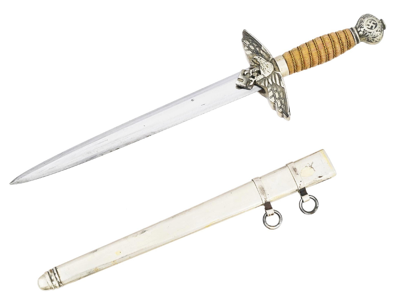 GERMAN WWII TYPE LUFTWAFFE 2ND MODEL MINIATURE DAGGER: A Second World War type miniature Second Model Luftwaffe Officer dagger. The dagger features a cross guard modeled as an eagle with spread wings clutching a swastika, the pommel shows relief oak leave