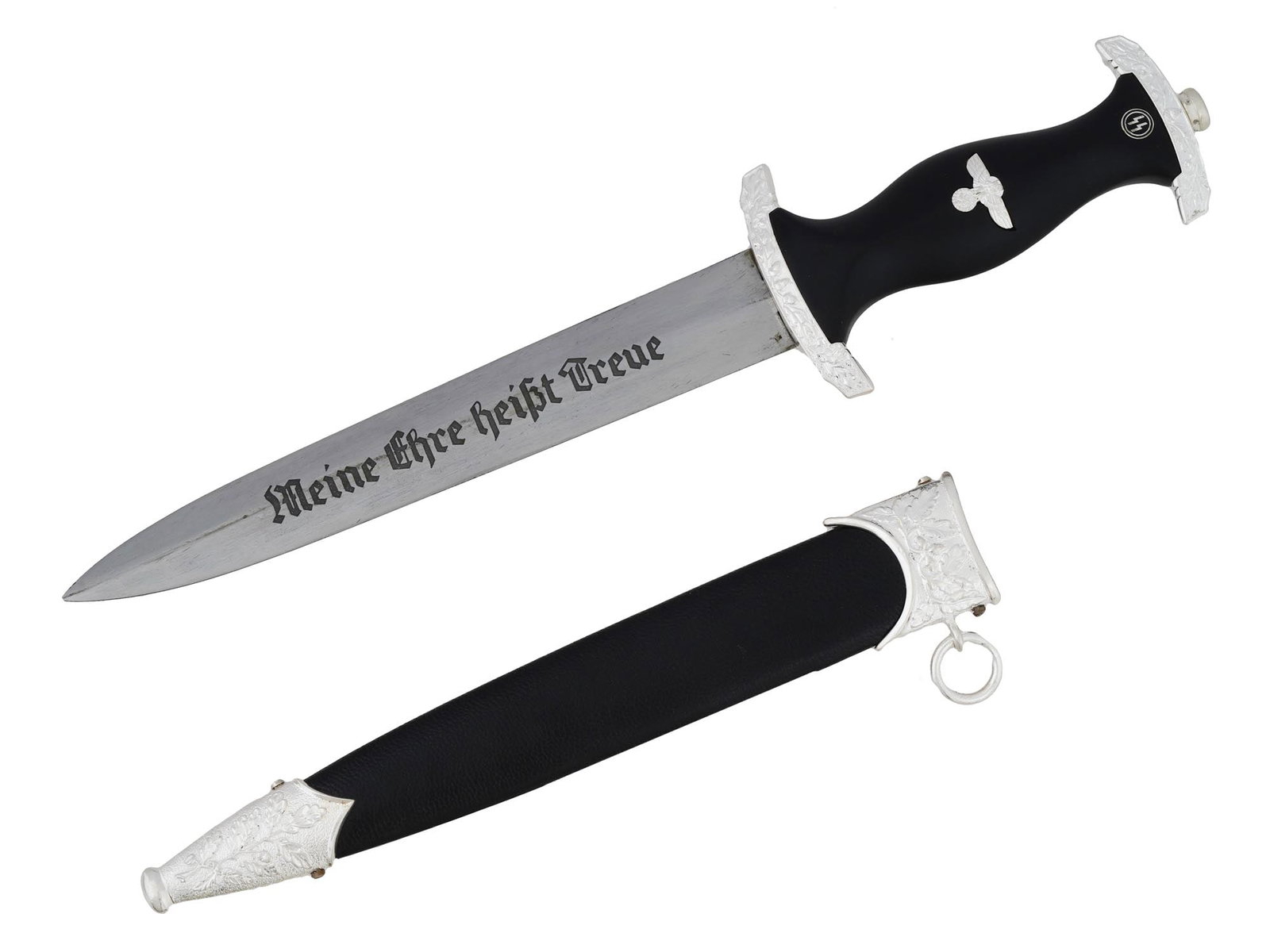 GERMAN WWII SS HONOR DAGGER W HIMMLERS INSCRIPTION: A World War II model Nazi German SS Ehrendolch or honor dagger. The stainless steel blade is garnished with etching, the motto Meine Ehre Heisst Treue, Loyalty is My Honour. Black ebony grip and scabb