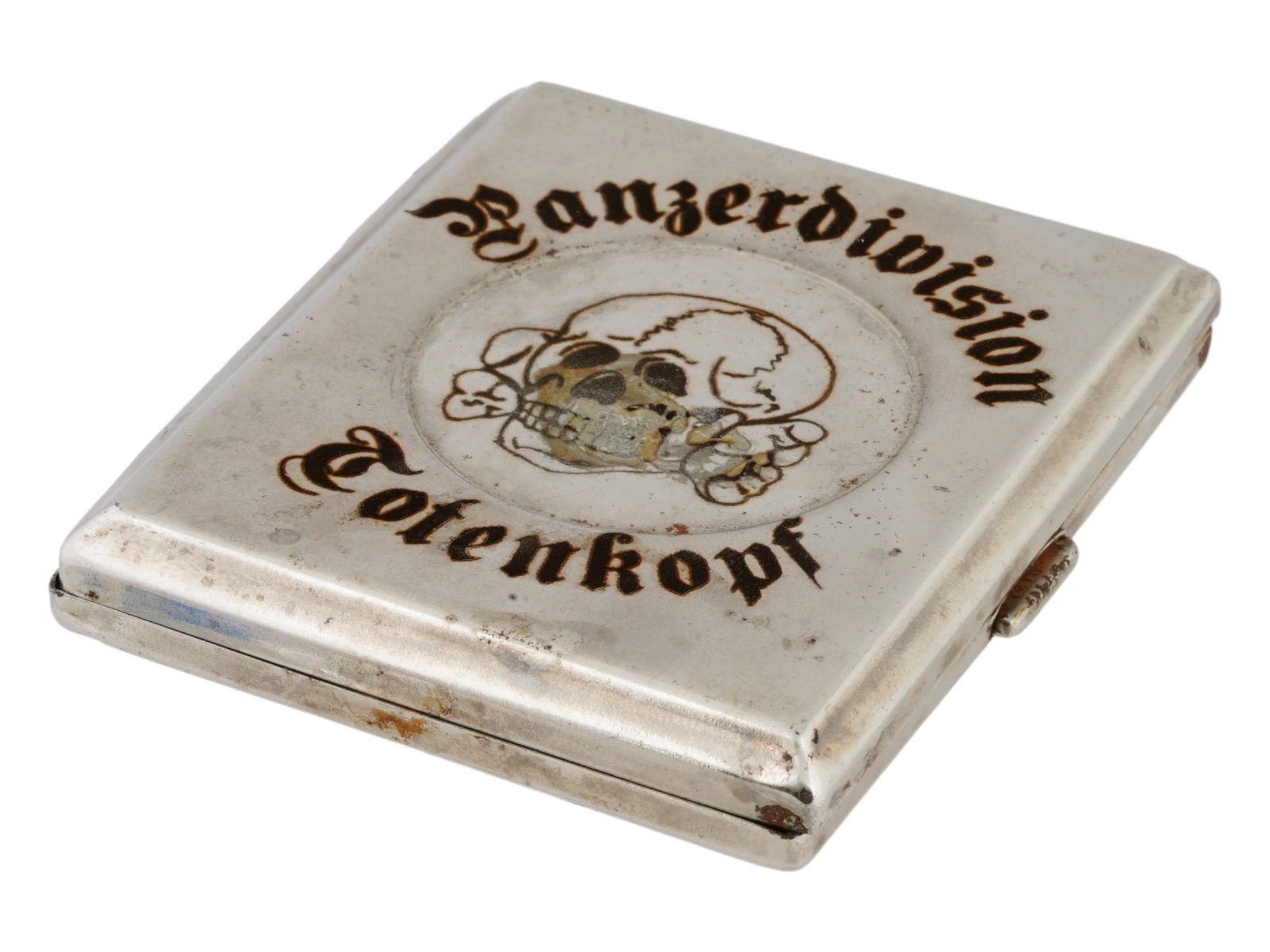 GERMAN WWII MODEL SS TOTENKOPF CIGARETTE CASE: A World War II type Nazi German cigarette case with a hinged cover featuring embossed an etched scull with inscription Panzerdivision Totenkopf. Two holder straps inside. The 3rd SS Panzer Division To