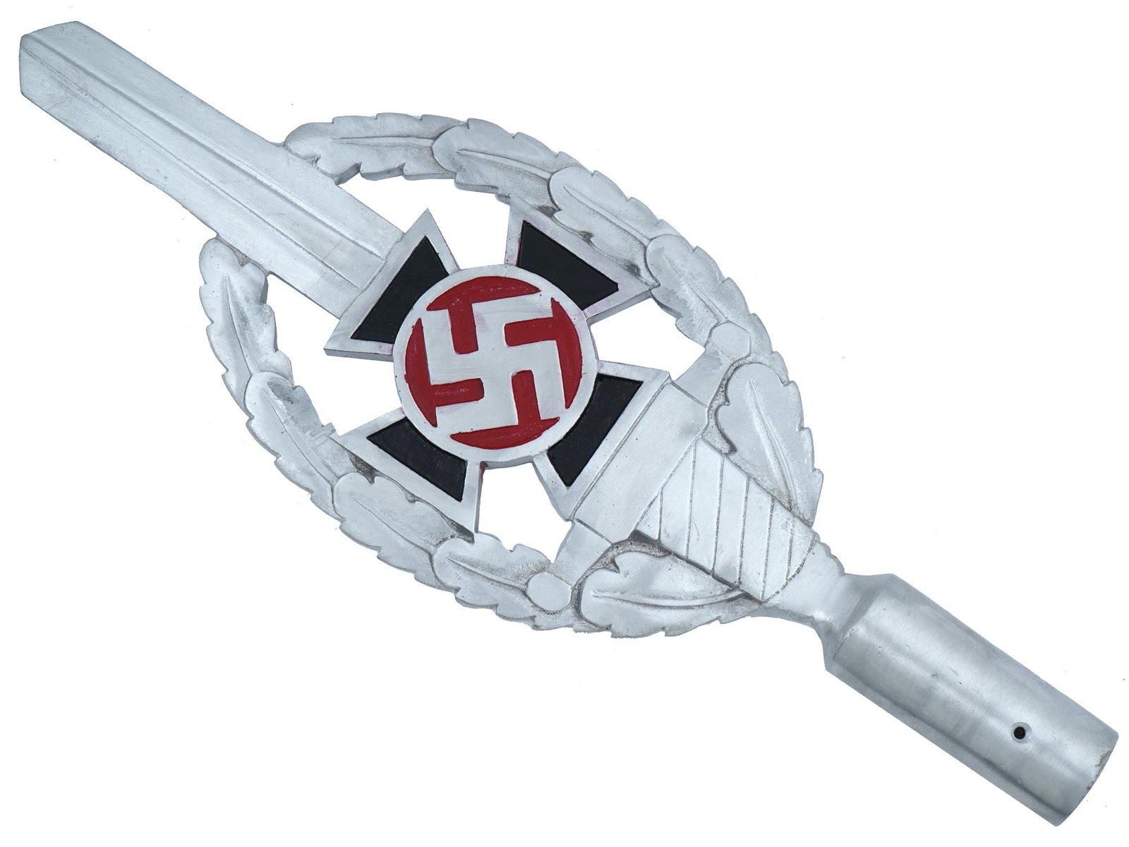 GERMAN WWII TYPE NSKOV FLAG POLE TOP: A WWII Nazi German Third Reich type NSKOV flag pole top. The flag pole top is made in the form of a sword pointing upward in an oval wreath of oak leaves. In the middle of the composition, there is a 