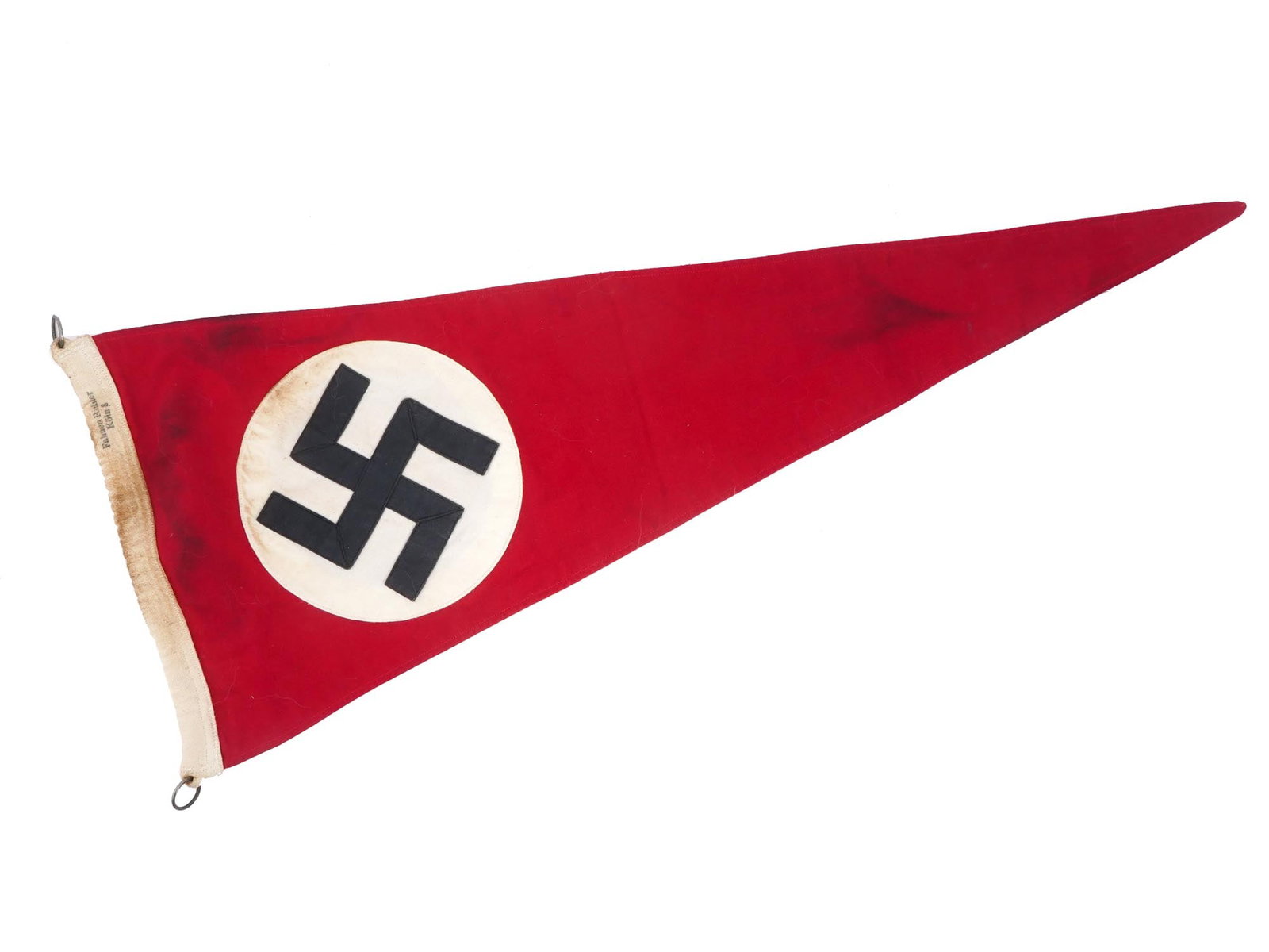 GERMAN WWII TYPE NSDAP PENNANT: A World War II type Nazi German NSDAP pennant flag. The pennant is made of red cotton fabric with sewn black and white swastika emblem on both sides. Marked Fahnen Richter Koln on the base rim. There 