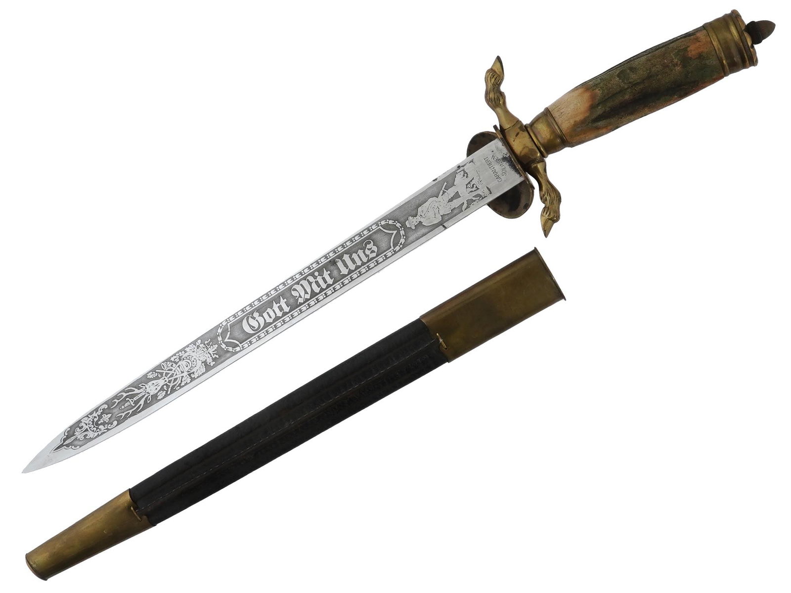 WWII TYPE GERMAN THIRD REICH HUNTING DAGGER W SCABBARD: A finely manufactured WWII type Nazi German hunting dagger featuring a double-edged blade with the etched lettering Gott Mitt Uns, God With Us, on the recto side, and trees and animals on the verso si