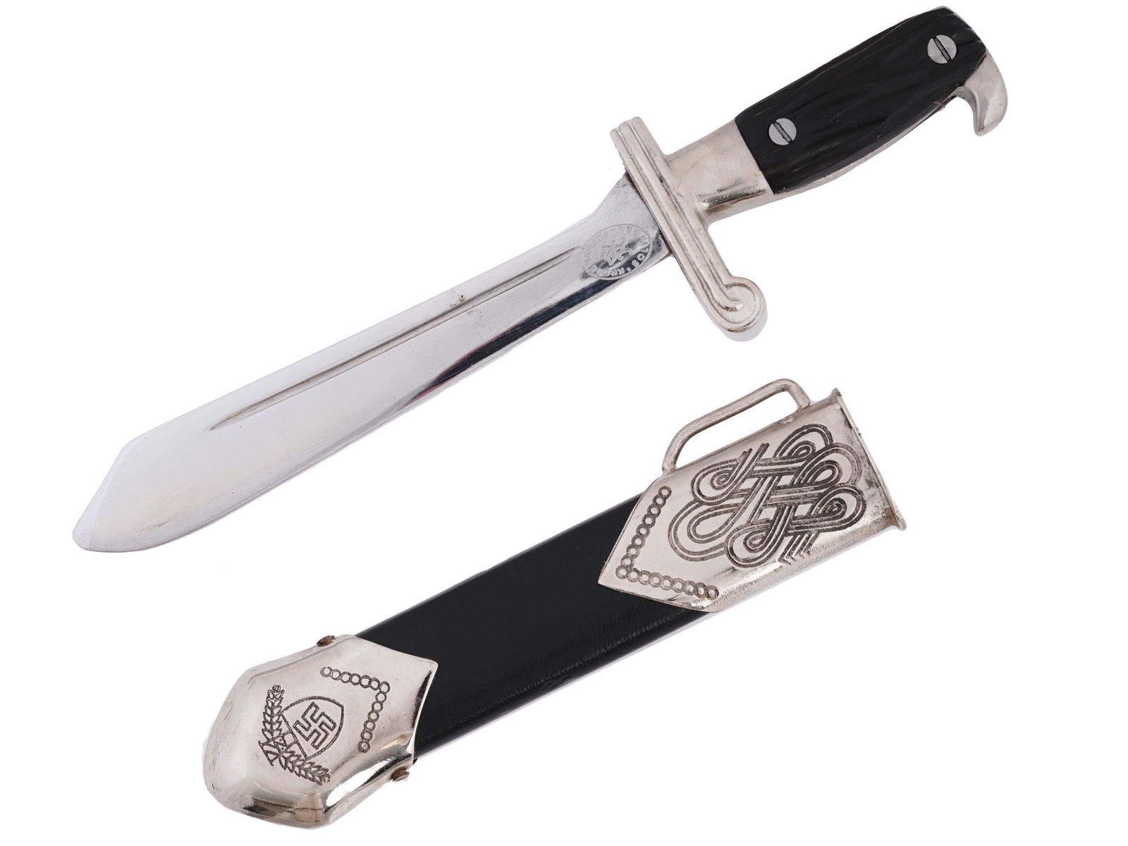 WWII MODEL NAZI GERMAN LABOUR SERVICE MINIATURE DAGGER: A WWII model Nazi German RAD Reich Labour Service miniature stainless steel dagger with a matching black leather scabbard. The dagger has a hardwood grip. The blade is decorated with an acid etched in