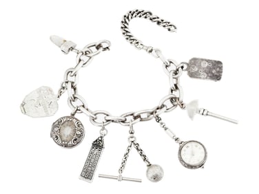 VINTAGE STERLING SILVER CHARMS BRACELET