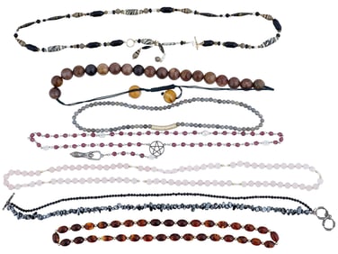 GROUP OF 7 BEADED NECKLACES OF VARIOUS MATERIALS