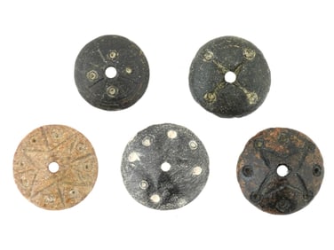 FIVE ANCIENT STONE SPINDLE WHORLS WITH DESIGNS