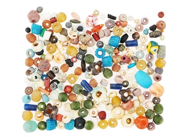 ANCIENT GLASS STONE BEADS OF VARIOUS COLORS AND SHAPES