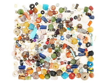 ANCIENT GLASS STONE BEADS OF VARIOUS COLORS AND SHAPES