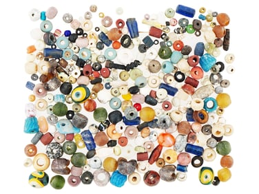 ANCIENT GLASS STONE BEADS OF VARIOUS COLORS AND SHAPES
