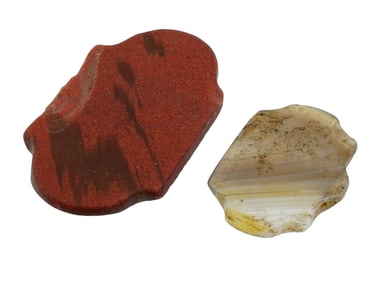 TWO ANCIENT HAND CARVED AGATE STONE PENDANTS