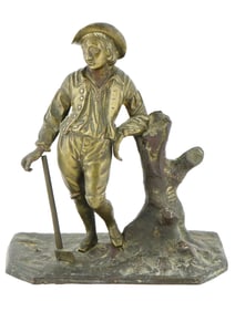 EUROPEAN PATINATED BRONZE FIGURINE OF MAN WITH AXE