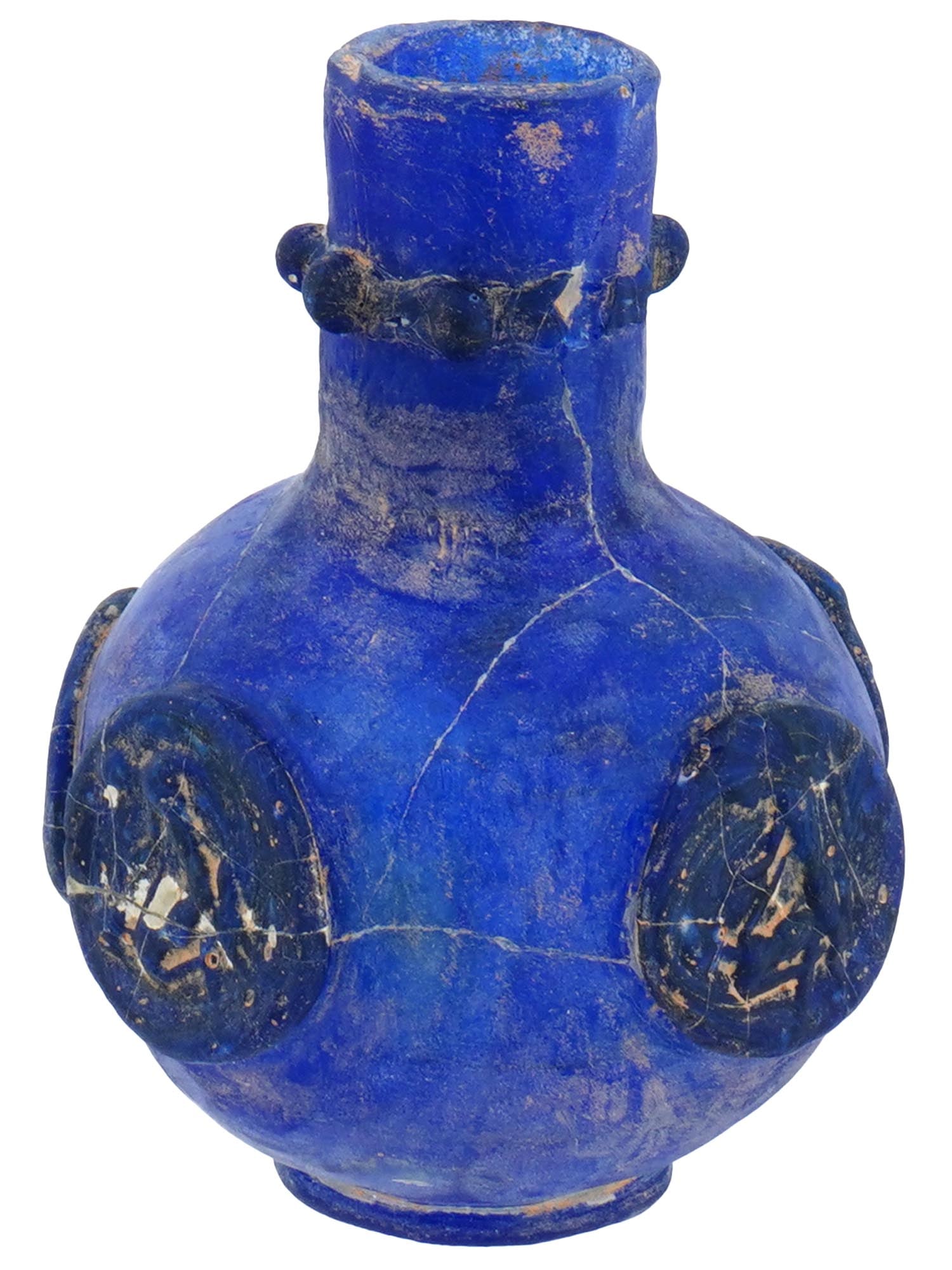 ANCIENT ROMAN HEAVY GLASS BOTTLE W EROTIC IMAGES: An ancient Roman heavy glass bottle, circa 100 to 300 AD. The bottle has a dark blue color, rounded body and tall cylindrical neck. The bottle adorned with 4 erotic images on the body. Ancient Archaeo