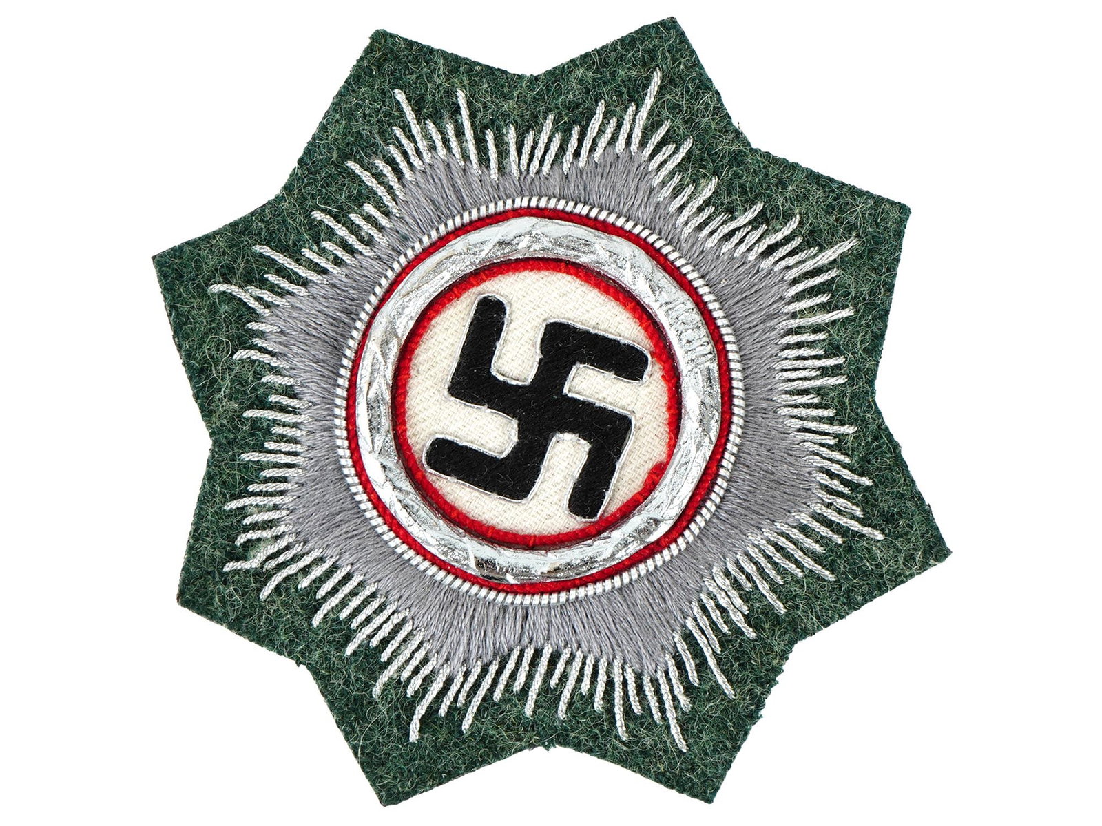 GERMAN WWII TYPE ORDER OF GERMAN CROSS IN SILVER ARMY: A WWII type Nazi German bullion Cross in silver. The cloth base has a gray sun embroidered with it's bursts pointing outwardly with a silver grey thread. Silver wire outlines the inner ring with red c