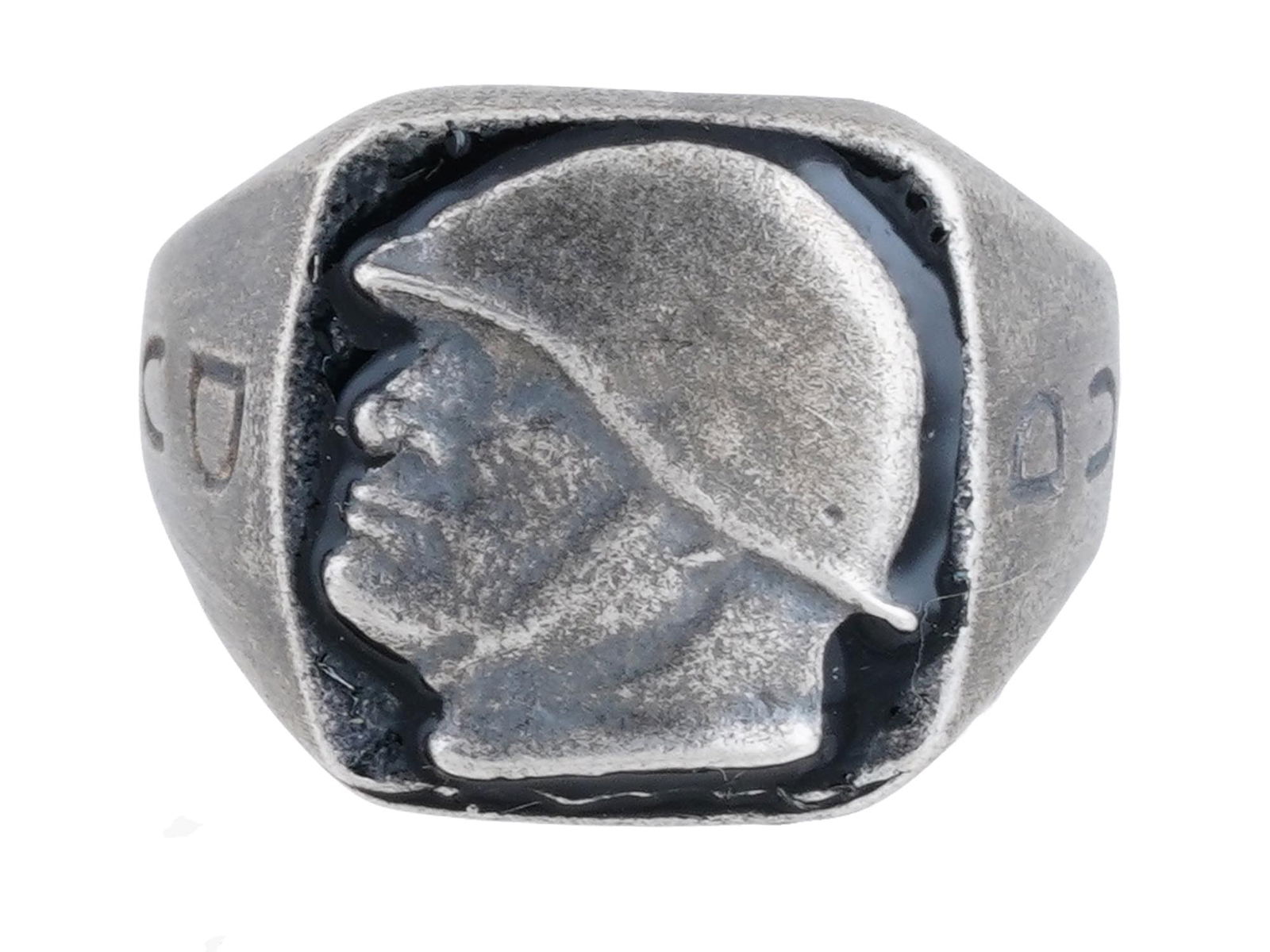 ITALIAN WWII TYPE BENITO MUSSOLINI SILVER RING: A WWII type Italian Benito Mussolini Silver ring. The ring features a relief profile of Benito Mussolini wearing a helmet, covered with enamel in a black shade. The letters DUX are engraved on the sid