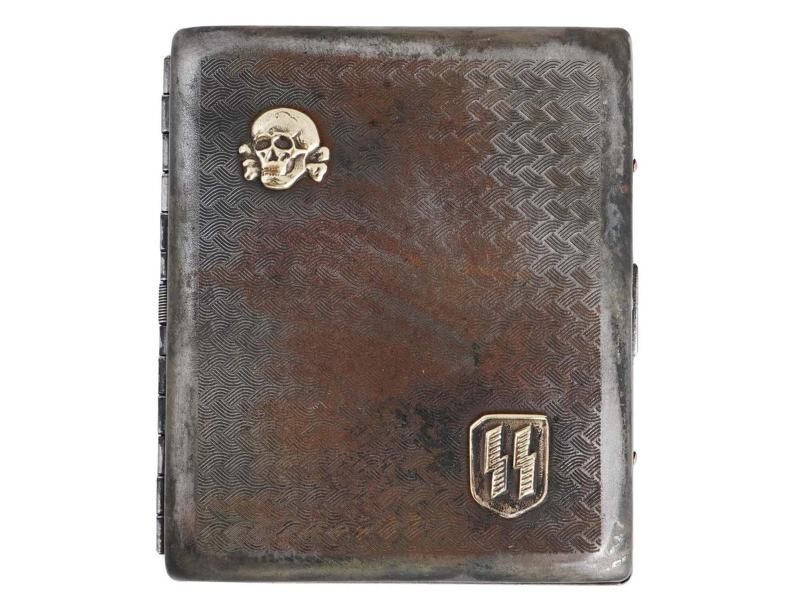 NAZI GERMAN WWII TYPE WAFFEN SS CIGARETTE CASE: A WWII Nazi German Third Reich type Waffen SS metal cigarette case. The case is adorned with an engraved ornament, and two metal overlays representing a Totenkopf skull and SS runes. Marked, RZM , SS,