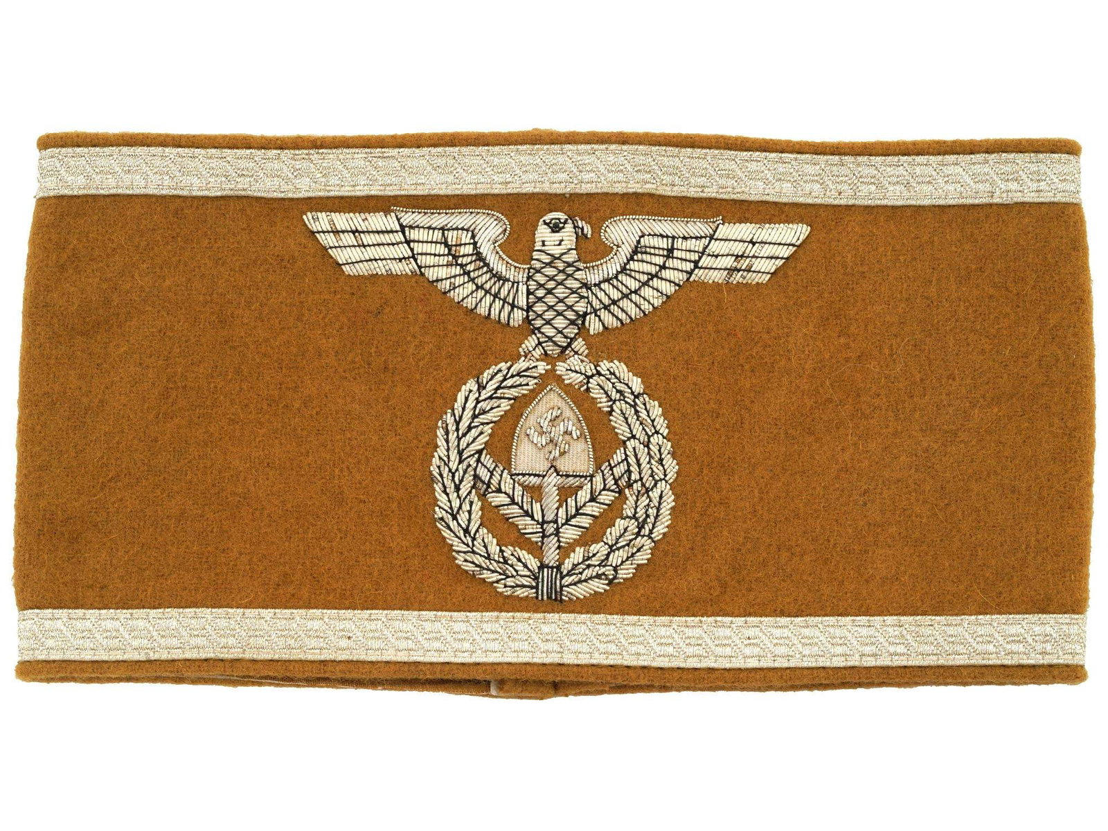 GERMAN WWII TYPE THIRD REICH RAD LEADER ARMBAND: A rare WWII type Nazi German Third Reich era RAD stuff leader armband. Constructed of light brown cloth, trimmed at both the top and bottom with machine embroidered silver aluminum wire bands, the ext