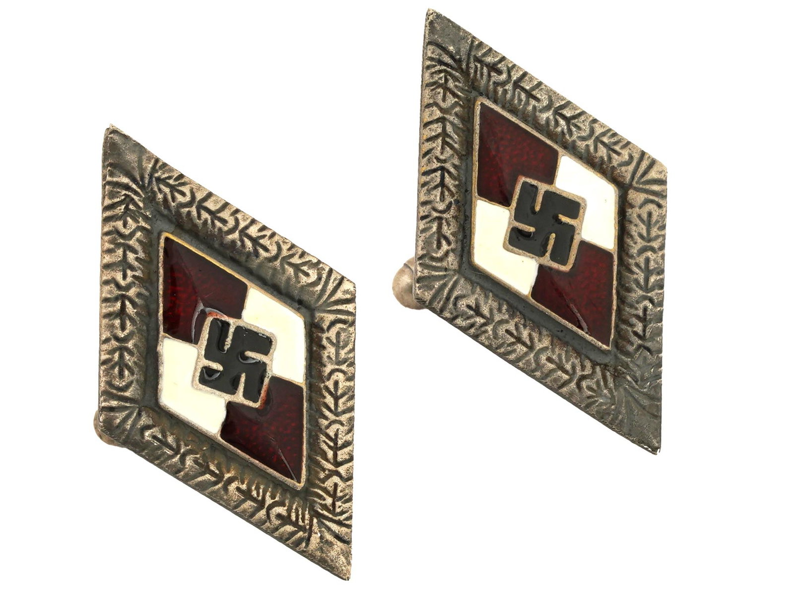 WWII TYPE GERMAN WAFFEN SS HITLERJUGEND CUFFLINKS: A pair of WWII type German Nazi Waffen SS division Hitlerjugend cufflinks. Featuring a diamond shaped enameled image of swastika surrounded by red and white enamel. Marked with RZM, BM, 1, 122 on the 
