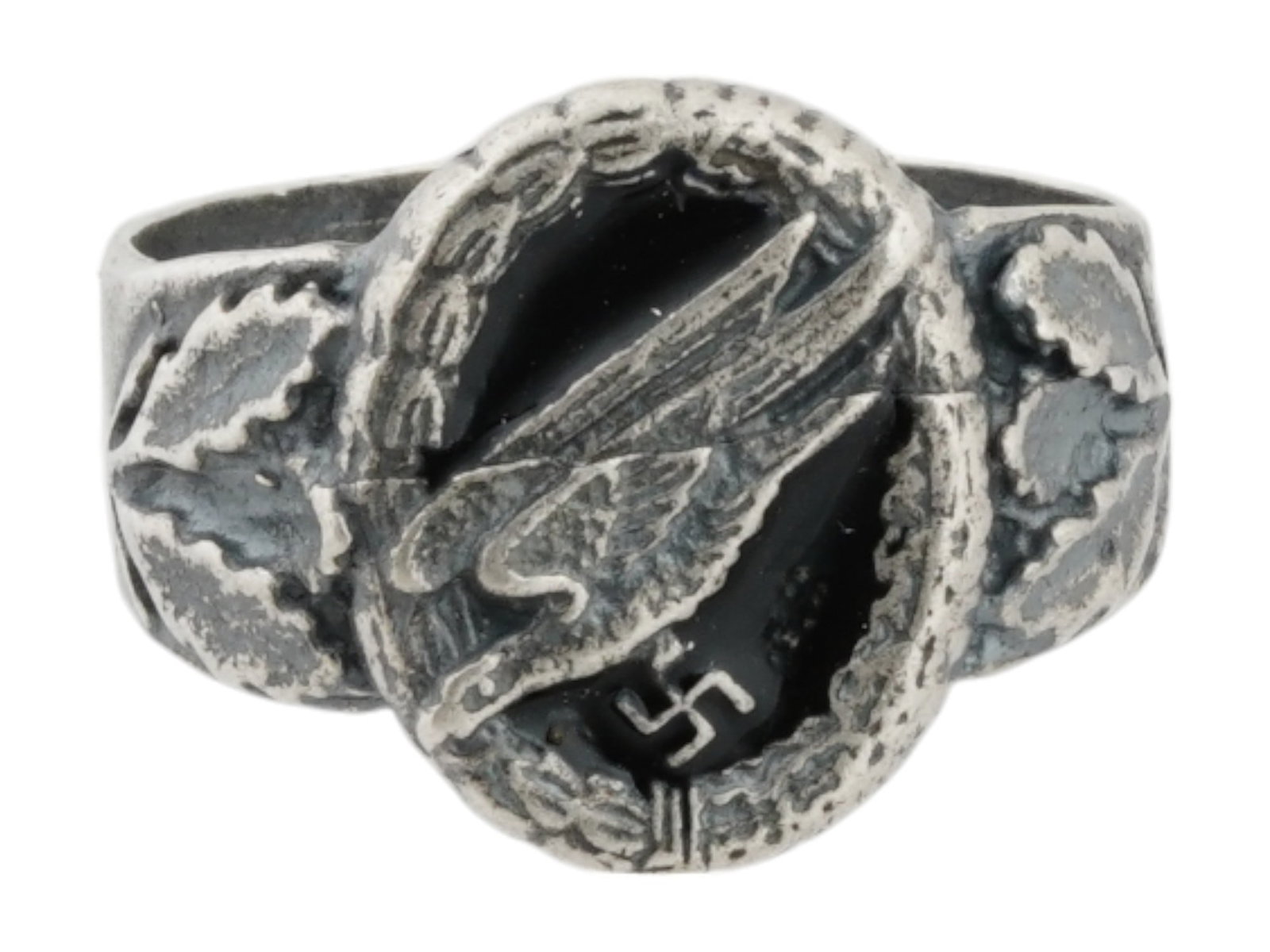 WWII MODEL NAZI GERMAN LUFTWAFFE PARATROOPER RING: A World War II type German Luftwaffe paratroopers signet ring. Flying eagle with swastika on the crown are flanked with oak leaves. Presumably made of silver. Total Weight: 6.6 grams. Second World War