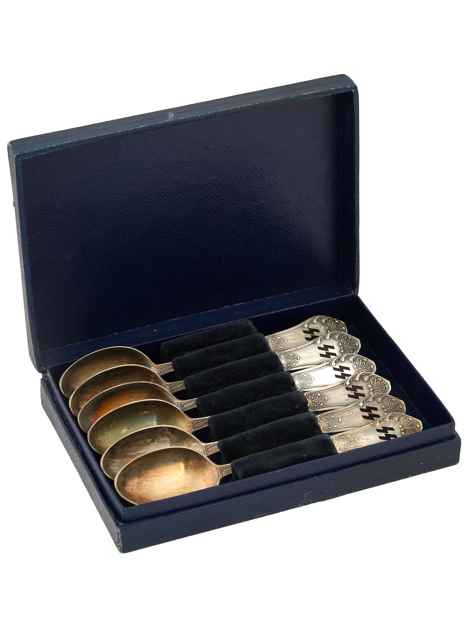 WWII NAZI GERMAN TEA SPOONS WAFFEN SS OFFICERS CANTEEN: A set of six WWII Nazi German tea spoons from a Waffen SS officers canteen, featuring a foliage motif and SS rune insignias on both sides of the handles, hallmarked and presented in the original box. 