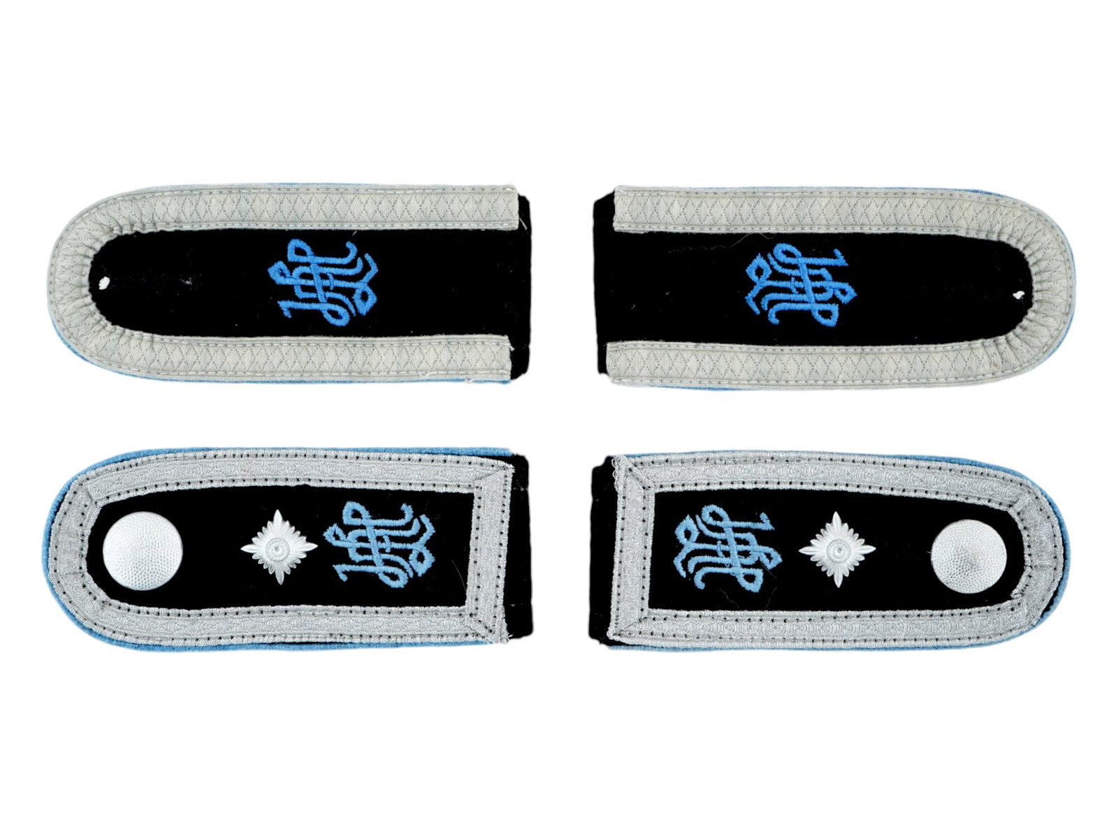 TWO PAIRS OF SHOULDER BOARDS FROM WAFFEN SS ADOLF HITLER: Two pairs of WWII type Nazi German Third Reich Waffen SS Leibstandarte Adolf Hitler division enlisted man shoulder boards. Each has a machine embroidered blue color LAH for Leibstandarte Adolf Hitler 