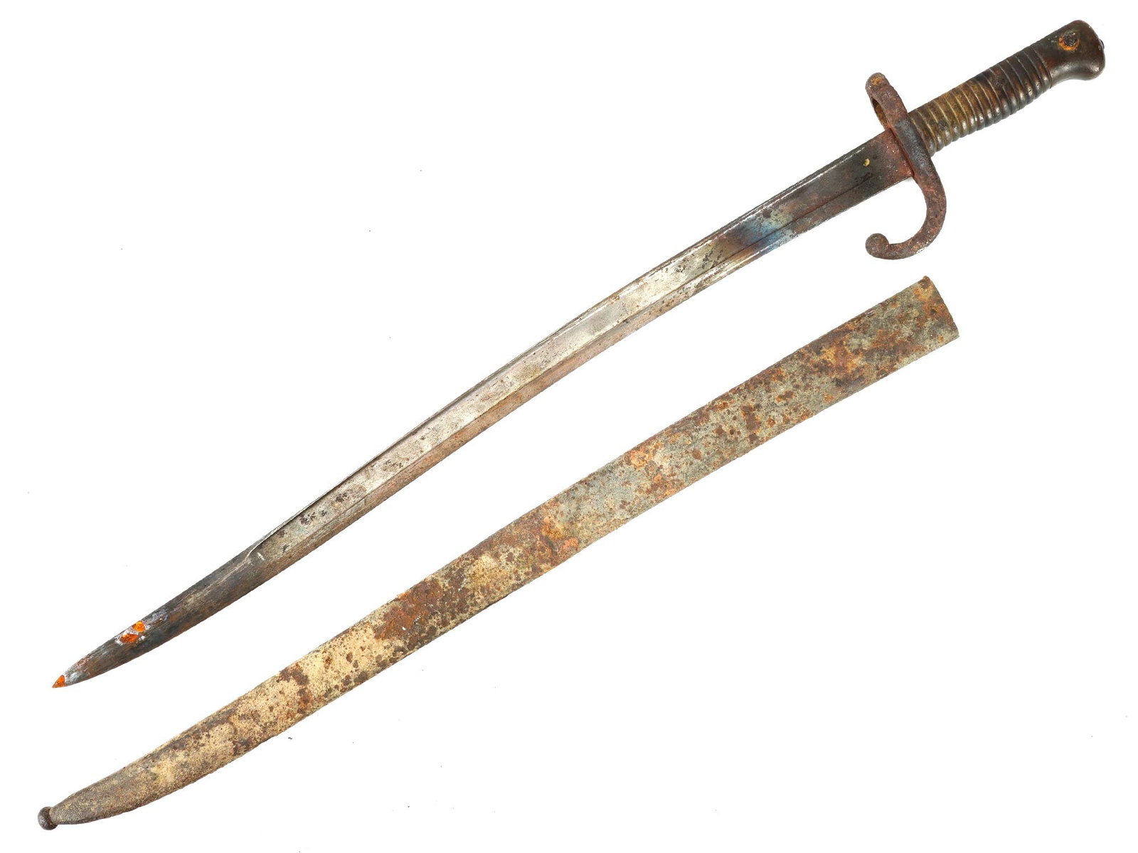 1867 FRENCH CHASSEPOT SWORD BAYONET IN SCABBARD: An antique late 19th century French sword bayonet designed for the 11 mm M1866 Chassepot needle fire rifle or the M1874 Gras rifle. Dated circa 1867. Slightly curved blade, ribbed grip, crossguard is 