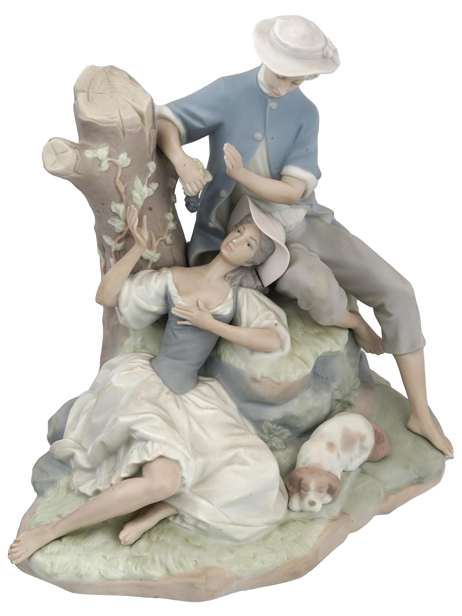 SPANISH HANDCRAFTED PORCELAIN FIGURINE BY LLADRO: A handcrafted porcelain figurine by Lladro, a Spanish porcelain manufacturer. The figurine represents a man and a woman relaxing in nature. Hallmark Lladro, Hand Made in Spain. Vintage Ceramic and Por