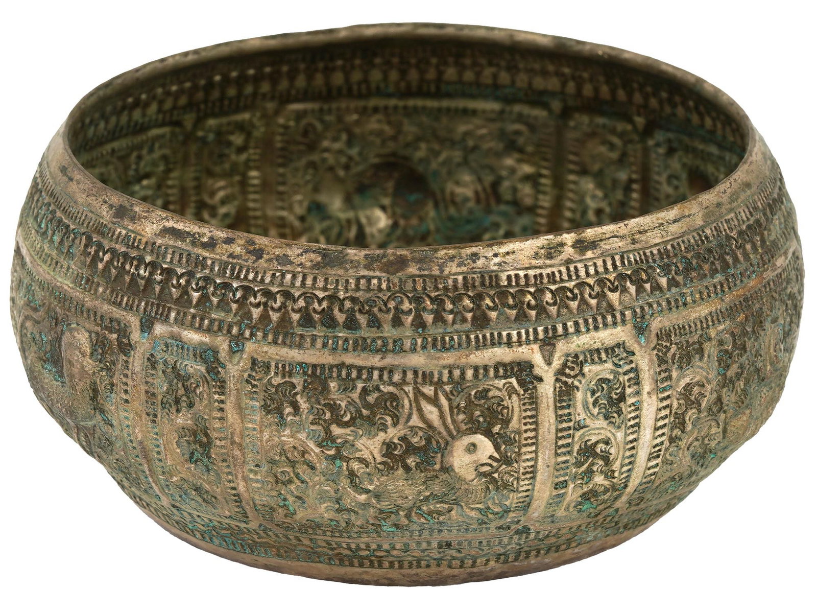 ANTIQUE PERSIAN SILVER RICHLY DECORATED BOWL: An antique Persian silver bowl. Circa the first half of the 20th century. The round, deep silver bowl is richly decorated with engraved patterns and images of animals, including a hare and a fox. Coll
