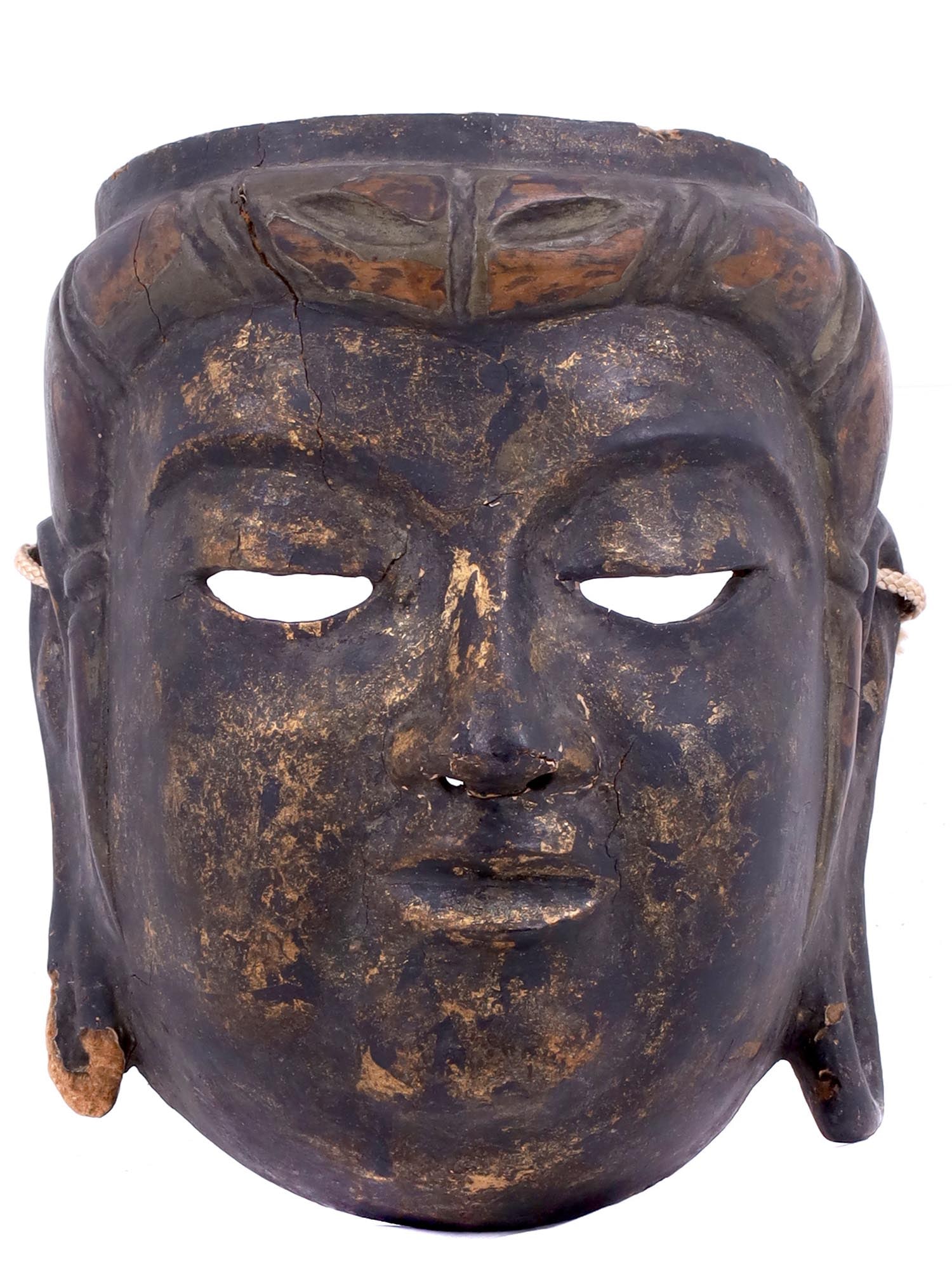 19TH C JAPAN BUDDHA WOODEN GILT CEREMONIAL MASK: A ceremonial carved giltwood mask of Buddha's face. Has a paper label on the inside. Late 19th century. Dimensions: H: 9 3/4 in., (24.8 cm.)