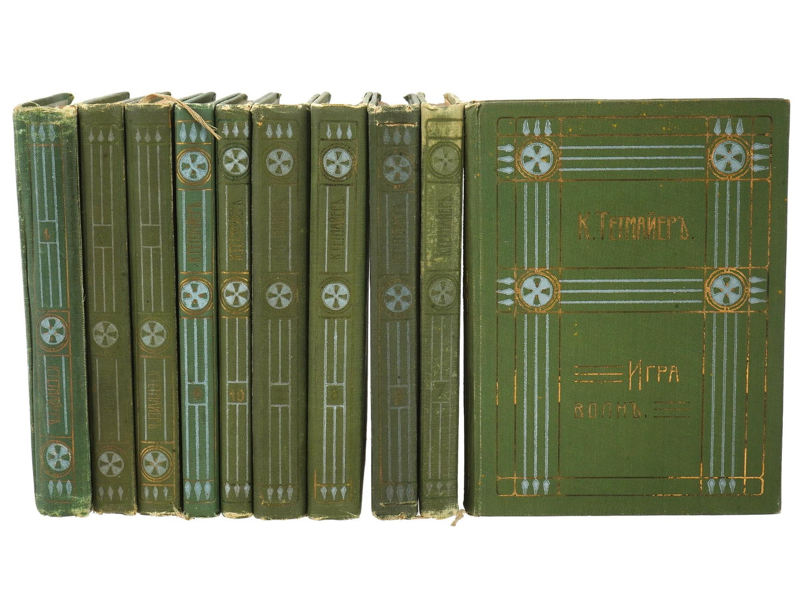 FULL SET ANTIQUE VOLUMES BOOKS BY KAZIMIERZ TETMAIER: A full set of ten antique volumes of collected works of the Polish writer Kazimierz Tetmaier present the novels Melancholia, Janosik Litmanovsky, The Game of Waves, and others. Hard covers. Gold and w