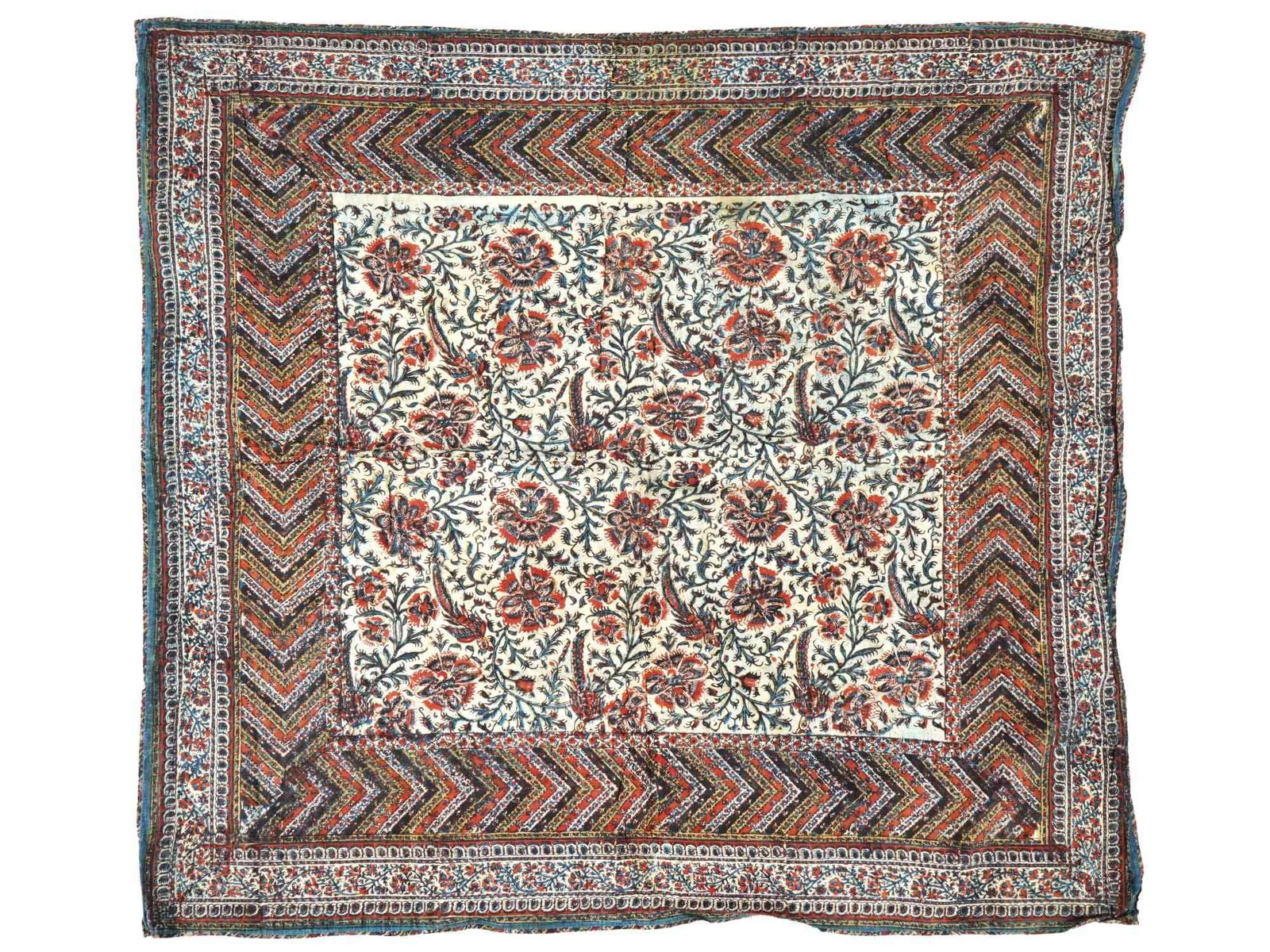 19TH CENTURY ANTIQUE KALAMKARI TEXTILE: An antique 19th century Kalamkari textile wall hanging. The textile is adorned with hand painted polychrome floral and foliage patterns on the front side and floral pattern on the back side. Kalamkari