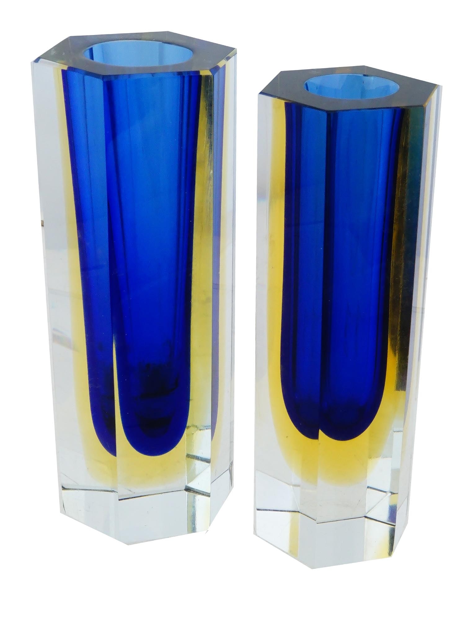 MURANO SOMMERSO BLUE FACETED PRISM ART GLASS VASES: A pair of Murano Sommerso cobalt blue and yellow faceted prism art glass vases. The vases feature a captivating combination of deep blue glass encased within clear glass. Each vase is designed with a 