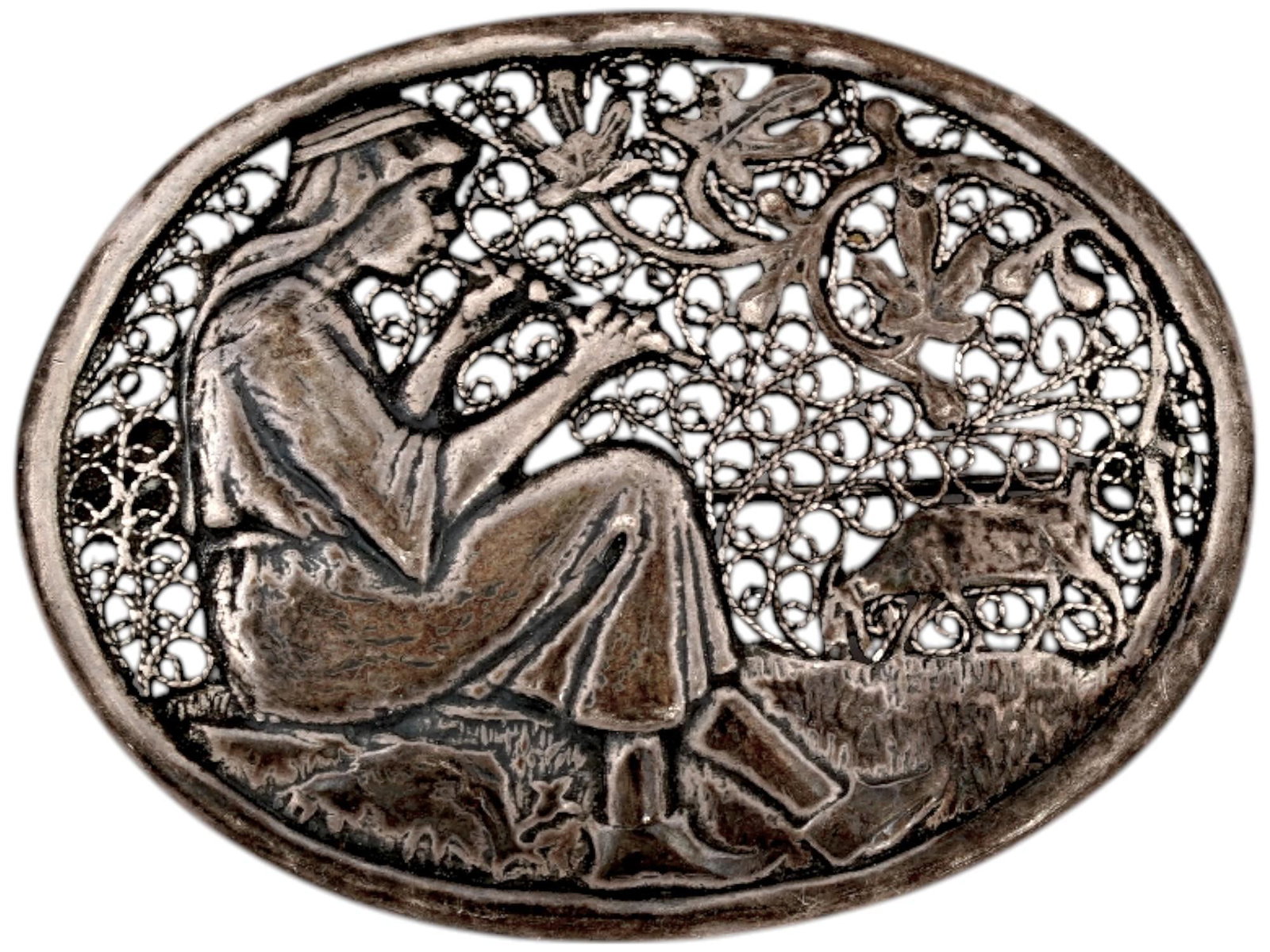 VINTAGE PALESTINE STERLING SILVER FILIGREE BROOCH: A vintage Palestine sterling silver filigree brooch. The openwork brooch depicts a seated shepherd boy playing a flute. Marked with 925 sterling silver, Made in Palestine on the back side. Vintage and