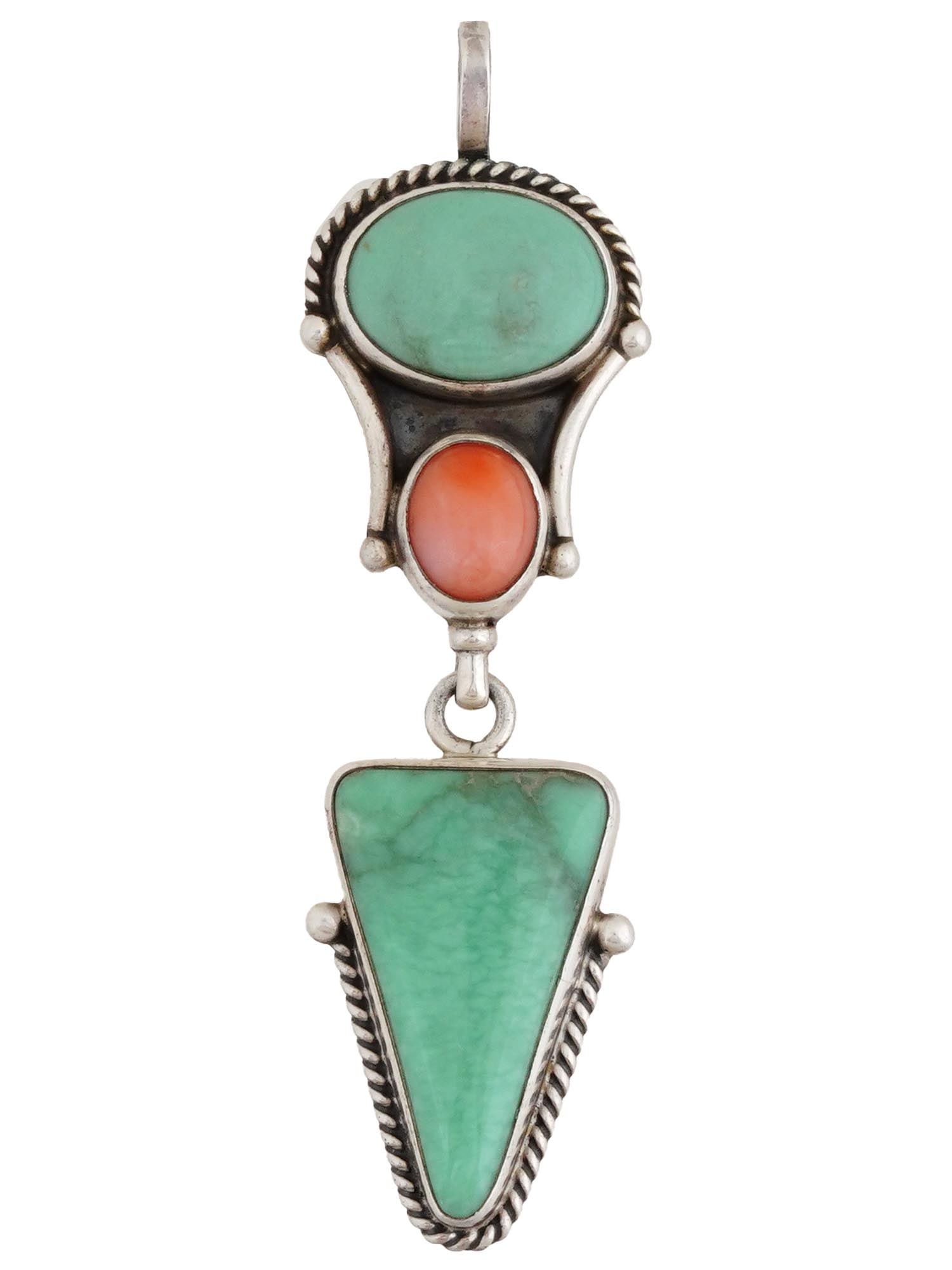 OLD PAWN NATIVE AMERICAN SILVER TURQUOISE CORAL PENDANT: An Old Pawn Native American sterling silver pendant with a dangle. Adorned with turquoise and coral stones framed in sterling silver fittings. Hallmarked with the sterling silver proof and Reve manufa