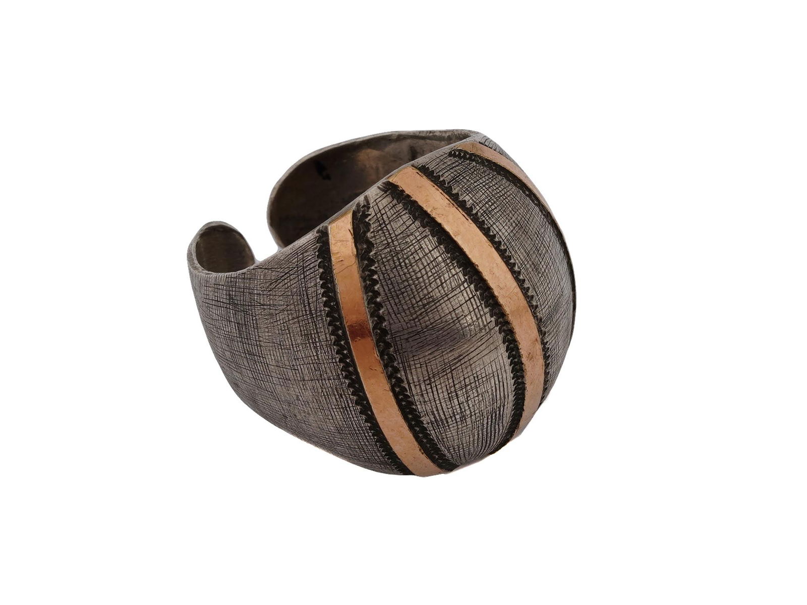 VINTAGE RING IN SILVER AND GOLD BY BUCCELLATI: A vintage ring in silver and gold by the jewelry house of Buccellati. The wide ring with a raised skin texture. Decorated with three vertical gold stripes with a scaly edge. Marked Buccellati on the i