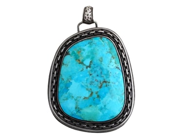 TURQUOISE PENDANT W DECORATIVE SILVER FRAME