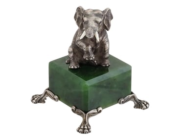 RUSSIAN SILVER FIGURINE OF AN ELEPHANT WITH RUBY EYES