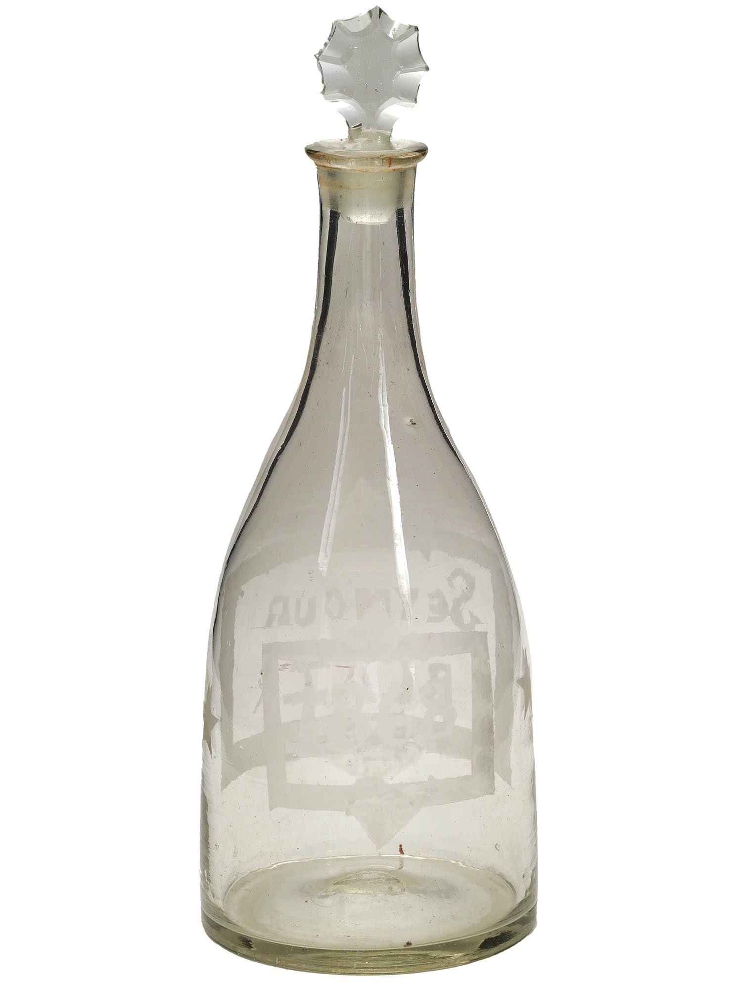 1868 DISI PRESIDENTAL SEYMOOR BLARR GLASS DECANTER: An 1868 Disi Presidential Seymour Blarr glass decanter with a stopper. The decanter features an elegant silhouette with a rounded body that tapers towards the neck. The decanter is topped with the des