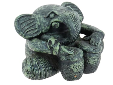 CERAMIC FIGURINE OF ELEPHANT PLAYING DRUMS