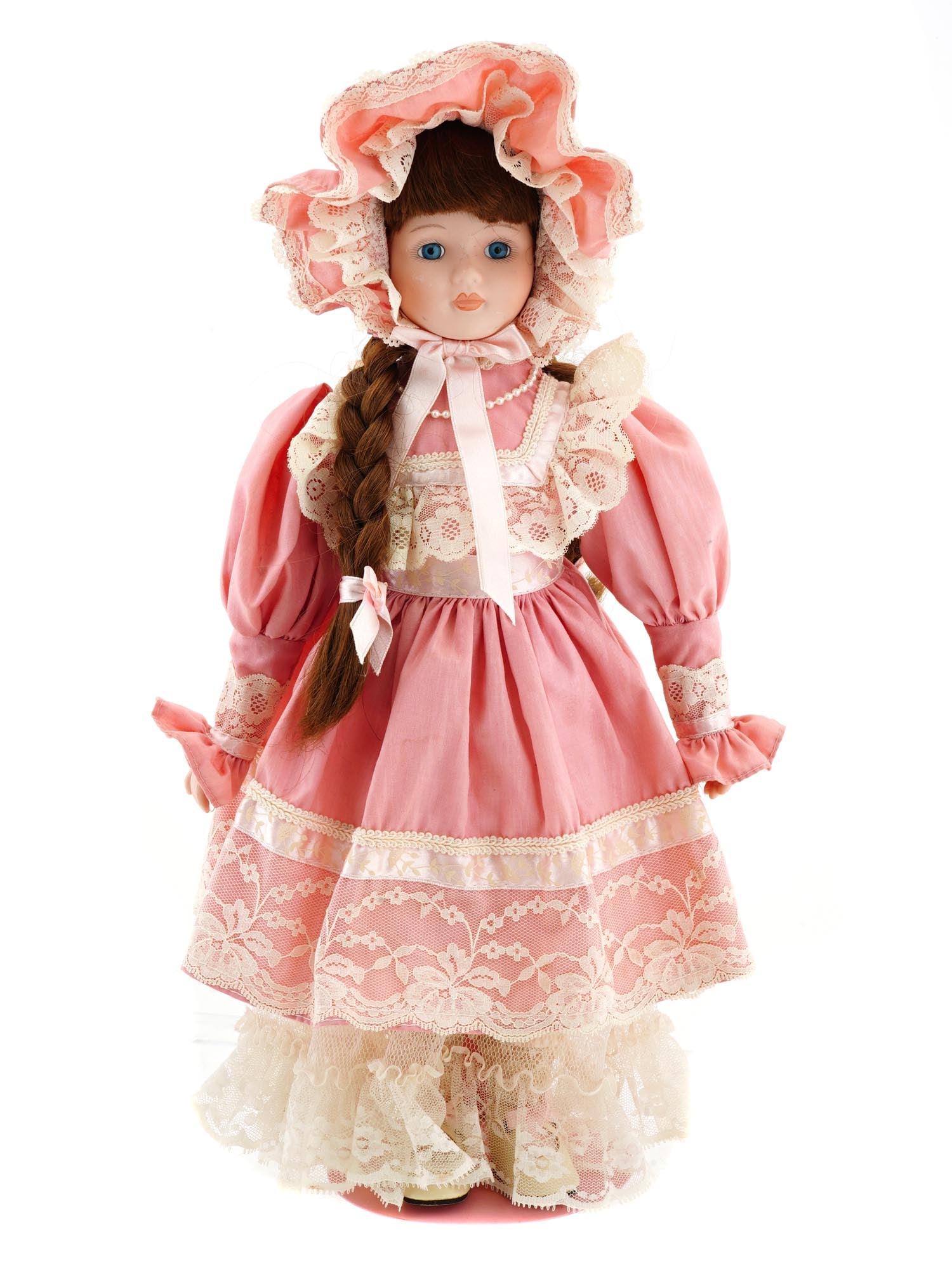 VINTAGE PRINCESS HOUSE KATRINA PORCELAIN DOLL 1990: A vintage porcelain doll Katrina by Princess House, copyrighted in 1990. The doll wears a beautiful pink dress with lace and ribbons. Bears the hallmark of an exclusive Princess House doll at the base