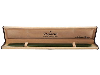 MID CENTURY DUFONTE CARVED JADE LETTER OPENER: A mid century carved jade letter opener in a branded box marked: lp Dufonte Diamond Collection by Lucien Piccard. Lucien Piccard, a brand enriched in vintage heritage and timeless style was founded in