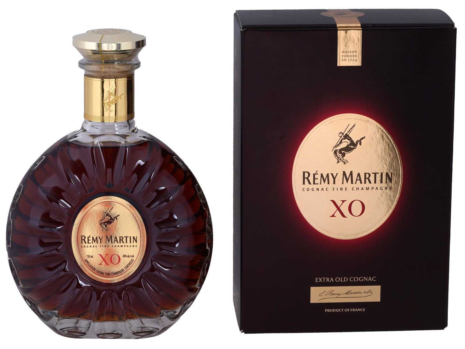 FRENCH REMY MARTIN XO FINE CHAMPAGNE COGNAC IOB: A sealed bottle of French Remy Martin XO Fine Champagne Cognac, renowned for its exceptional quality. Blended from eaux de vie exclusively sourced from the Grande and Petite Champagne regions, this XO