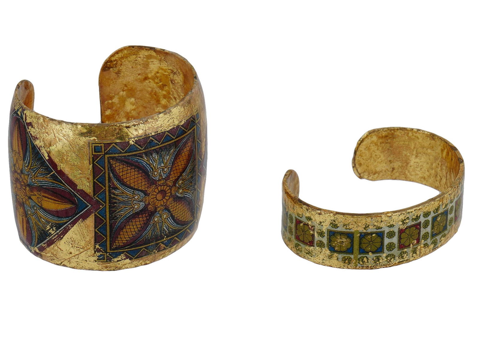 VINTAGE AMERICAN ENAMEL CUFF BRACELETS BY EVOCATEUR: A lot of two vintage American gilt enamel handcrafted cuff bracelets by Evocateur. Bracelets of different widths with intricate geometric and floral enamel patterns inspired by antiquity and oriental
